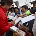 Roberto Merhi (ESP) Marussia signs autographs for the fans at Formula One World Championship, Rd14, Japanese Grand Prix, Preparations, Suzuka, Japan, Thursday 24 September 2015. © Sutton Motorsport Images