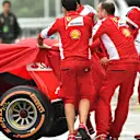 Ferrari mechanics with Ferrari SF15-T at Formula One World Championship, Rd14, Japanese Grand Prix, Preparations, Suzuka, Japan, Thursday 24 September 2015. © Sutton Motorsport Images