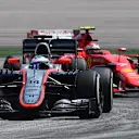 Fernando Alonso (ESP) McLaren MP4-30 leads Kimi Raikkonen (FIN) Ferrari SF15-T at Formula One World Championship, Rd2, Malaysian Grand Prix, Practice, Sepang, Malaysia, Friday 27  March 2015. © Sutton Motorsport Images