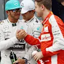 Pole sitter Lewis Hamilton (GBR) Mercedes AMG F1 celebrates with Sebastian Vettel (GER) Ferrari in parc ferme at Formula One World Championship, Rd2, Malaysian Grand Prix, Qualifying, Sepang, Malaysia, Saturday 28  March 2015. © Sutton Motorsport Images