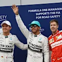 (L to R): Third placed Nico Rosberg (GER) Mercedes AMG F1, pole sitter Lewis Hamilton (GBR) Mercedes AMG F1 and second placed Sebastian Vettel (GER) Ferrari celebrate in parc ferme at Formula One World Championship, Rd2, Malaysian Grand Prix, Qualifying, Sepang, Malaysia, Saturday 28  March 2015. © Sutton Motorsport Images