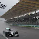 Nico Rosberg (GER) Mercedes AMG F1 W06 takes the chequered flag and third place in Qualifying at Formula One World Championship, Rd2, Malaysian Grand Prix, Qualifying, Sepang, Malaysia, Saturday 28  March 2015. © Sutton Motorsport Images