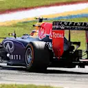 Daniil Kvyat (RUS) Red Bull Racing RB11 spins after contact with Nico Hulkenberg (GER) Force India VJM08 at Formula One World Championship, Rd2, Malaysian Grand Prix, Race, Sepang, Malaysia, Sunday 29 March 2015. © Sutton Motorsport Images