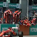 Race winner Sebastian Vettel (GER) Ferrari SF15-T crosses the line at Formula One World Championship, Rd2, Malaysian Grand Prix, Race, Sepang, Malaysia, Sunday 29 March 2015. © Sutton Motorsport Images
