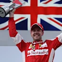 Race winner Sebastian Vettel (GER) Ferrari celebrates on the podium on the podium at Formula One World Championship, Rd2, Malaysian Grand Prix, Race, Sepang, Malaysia, Sunday 29 March 2015. © Sutton Motorsport Images