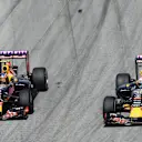 Daniil Kvyat (RUS) Red Bull Racing RB11 and Daniel Ricciardo (AUS) Red Bull Racing RB11 battle at Formula One World Championship, Rd2, Malaysian Grand Prix, Race, Sepang, Malaysia, Sunday 29 March 2015. © Sutton Motorsport Images