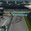 Lewis Hamilton (GBR) Mercedes AMG F1 W06 leads at the start at Formula One World Championship, Rd2, Malaysian Grand Prix, Race, Sepang, Malaysia, Sunday 29 March 2015. © Sutton Motorsport Images