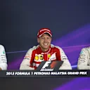 (L to R): Lewis Hamilton (GBR) Mercedes AMG F1, Sebastian Vettel (GER) Ferrari and Nico Rosberg (GER) Mercedes AMG F1 in the post race Press at Formula One World Championship, Rd2, Malaysian Grand Prix, Race, Sepang, Malaysia, Sunday 29 March 2015. © Sutton Motorsport Images