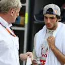 Dr Helmut Marko (AUT) Red Bull Motorsport Consultant talks with Carlos Sainz jr (ESP) Scuderia Toro Rosso at Formula One World Championship, Rd2, Malaysian Grand Prix, Race, Sepang, Malaysia, Sunday 29 March 2015. © Sutton Motorsport Images