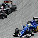 Marcus Ericsson (SWE) Sauber C34 and Nico Hulkenberg (GER) Force India VJM08 battle at Formula One World Championship, Rd2, Malaysian Grand Prix, Race, Sepang, Malaysia, Sunday 29 March 2015. © Sutton Motorsport Images