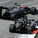 Fernando Alonso (ESP) McLaren MP4-30 and Sergio Perez (MEX) Force India VJM08 bttle at Formula One World Championship, Rd2, Malaysian Grand Prix, Race, Sepang, Malaysia, Sunday 29 March 2015. © Sutton Motorsport Images