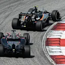 Fernando Alonso (ESP) McLaren MP4-30 and Sergio Perez (MEX) Force India VJM08 at Formula One World Championship, Rd2, Malaysian Grand Prix, Race, Sepang, Malaysia, Sunday 29 March 2015. © Sutton Motorsport Images