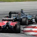 Kimi Raikkonen (FIN) Ferrari SF15-T follows Nico Rosberg (GER) Mercedes AMG F1 W06 at Formula One World Championship, Rd2, Malaysian Grand Prix, Race, Sepang, Malaysia, Sunday 29 March 2015. © Sutton Motorsport Images