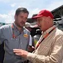 Paul Hembery (GBR) Pirelli Motorsport Director and Niki Lauda (AUT) Mercedes AMG F1 Non-Executive Chairman on the grid at Formula One World Championship, Rd2, Malaysian Grand Prix, Race, Sepang, Malaysia, Sunday 29 March 2015. © Sutton Motorsport Images