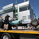 The car of Lewis Hamilton (GBR) Mercedes AMG F1 W06 is recovered to the pits in Free Practice One at Formula One World Championship, Rd2, Malaysian Grand Prix, Practice, Sepang, Malaysia, Friday 27  March 2015. © Sutton Motorsport Images