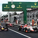 Alexander Rossi (USA) Marussia and Daniil Kvyat (RUS) Red Bull Racing RB11 at Formula One World Championship, Rd17, Mexican Grand Prix, Practice, Circuit Hermanos Rodriguez, Mexico City, Mexico, Friday 30 October 2015. © Sutton Motorsport Images
