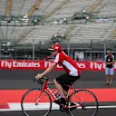 Kimi Raikkonen (FIN) Ferrari rides the circuit on a bike at Formula One World Championship, Rd17, Mexican Grand Prix, Preparations, Circuit Hermanos Rodriguez, Mexico City, Mexico, Thursday 29 October 2015. © Sutton Motorsport Images