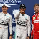 (L to R): Nico Rosberg (GER) Mercedes AMG F1 pole sitter Lewis Hamilton (GBR) Mercedes AMG F1 and Sebastian Vettel (GER) Ferrari celebrate in parc ferme at Formula One World Championship, Rd6, Monaco Grand Prix Qualifying, Monte-Carlo, Monaco, Saturday 23 May 2015. © Sutton Motorsport Images
