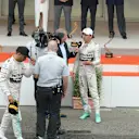 Lewis Hamilton (GBR) Mercedes AMG F1 after the podium as Nico Rosberg (GER) Mercedes AMG F1 talks with Martin Brundle (GBR) Sky TV at Formula One World Championship, Rd6, Monaco Grand Prix Race, Monte-Carlo, Monaco, Sunday 24 May 2015. © Sutton Motorsport Images