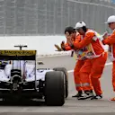 Marshals and Marcus Ericsson (SWE) Sauber C34 at Formula One World Championship, Rd15, Russian Grand Prix, Practice, Sochi Autodrom, Sochi, Krasnodar Krai, Russia, Friday 9 October 2015. © Sutton Motorsport Images