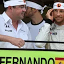 Fernando Alonso (ESP) McLaren celebrates 250 Grands Prix with Eric Boullier (FRA) McLaren Racing Director, Jenson Button (GBR) McLaren and the team at Formula One World Championship, Rd15, Russian Grand Prix, Practice, Sochi Autodrom, Sochi, Krasnodar Krai, Russia, Friday 9 October 2015. © Sutton Motorsport Images