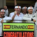 Fernando Alonso (ESP) McLaren celebrates 250 Grands Prix with Eric Boullier (FRA) McLaren Racing Director, Jenson Button (GBR) McLaren and the team at Formula One World Championship, Rd15, Russian Grand Prix, Practice, Sochi Autodrom, Sochi, Krasnodar Krai, Russia, Friday 9 October 2015. © Sutton Motorsport Images