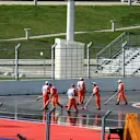 Marshals clean the track before FP1 at Formula One World Championship, Rd15, Russian Grand Prix, Practice, Sochi Autodrom, Sochi, Krasnodar Krai, Russia, Friday 9 October 2015. © Sutton Motorsport Images