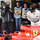 Lewis Hamilton (GBR) Mercedes AMG F1 W06 looks at the car of Sebastian Vettel (GER) Ferrari SF15-T in parc ferme at Formula One World Championship, Rd15, Russian Grand Prix, Qualifying, Sochi Autodrom, Sochi, Krasnodar Krai, Russia, Saturday 10 October 2015. © Sutton Motorsport Images