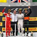 (L-R) Sebastian Vettel (GER) Ferrari, Andy Cowell (GBR) Managing Director, race winner Lewis Hamilton (GBR) Mercedes AMG F1 and Sergio Perez (MEX) Force India celebrate on the podium at Formula One World Championship, Rd15, Russian Grand Prix, Race, Sochi Autodrom, Sochi, Krasnodar Krai, Russia, Sunday 11 October 2015. © Sutton Motorsport Images