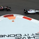 Jenson Button (GBR) McLaren MP4-30 and Felipe Massa (BRA) Williams FW37 at Formula One World Championship, Rd15, Russian Grand Prix, Race, Sochi Autodrom, Sochi, Krasnodar Krai, Russia, Sunday 11 October 2015. © Sutton Motorsport Images