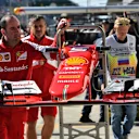 Ferrari mechanics with Ferrari SF15-T front wing at Formula One World Championship, Rd15, Russian Grand Prix, Race, Sochi Autodrom, Sochi, Krasnodar Krai, Russia, Sunday 11 October 2015. © Sutton Motorsport Images