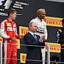(L to R): Andy Cowell (GBR) Managing Director, Vladimir Putin (RUS), President of Russia, Sebastian Vettel (GER) Ferrari, race winner Lewis Hamilton (GBR) Mercedes AMG F1 and Sergio Perez (MEX) Force India celebrate on the podium at Formula One World Championship, Rd15, Russian Grand Prix, Race, Sochi Autodrom, Sochi, Krasnodar Krai, Russia, Sunday 11 October 2015. © Sutton Motorsport Images