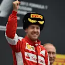 Sebastian Vettel (GER) Ferrari celebrates on the podium at Formula One World Championship, Rd15, Russian Grand Prix, Race, Sochi Autodrom, Sochi, Krasnodar Krai, Russia, Sunday 11 October 2015. © Sutton Motorsport Images