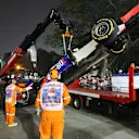 The car of Will Stevens (GBR) Manor GP is recovered after crashing out in FP2 at Formula One World Championship, Rd13, Singapore Grand Prix, Practice, Marina Bay Street Circuit, Singapore, Friday 18 September 2015. © Sutton Motorsport Images
