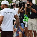 Lewis Hamilton (GBR) Mercedes AMG F1 and photographers at Formula One World Championship, Rd13, Singapore Grand Prix, Practice, Marina Bay Street Circuit, Singapore, Friday 18 September 2015. © Sutton Motorsport Images