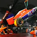 The car of Will Stevens (GBR) Marussia is recovered after crashing out in FP2 at Formula One World Championship, Rd13, Singapore Grand Prix, Practice, Marina Bay Street Circuit, Singapore, Friday 18 September 2015. © Sutton Motorsport Images