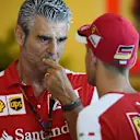 Maurizio Arrivabene (ITA) Ferrari Team Principal and Sebastian Vettel (GER) Ferrari at Formula One World Championship, Rd13, Singapore Grand Prix, Practice, Marina Bay Street Circuit, Singapore, Friday 18 September 2015. © Sutton Motorsport Images