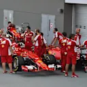 Ferrari mechanics with the Ferrari SF15-T cars at Formula One World Championship, Rd13, Singapore Grand Prix, Qualifying, Marina Bay Street Circuit, Singapore, Saturday 19  September 2015. © Sutton Motorsport Images