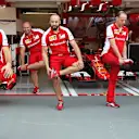 Ferrari mechanics warm up for their pit stop practice at Formula One World Championship, Rd13, Singapore Grand Prix, Qualifying, Marina Bay Street Circuit, Singapore, Saturday 19  September 2015. © Sutton Motorsport Images
