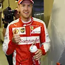Pole sitter Sebastian Vettel (GER) Ferrari celebrates in parc ferme at Formula One World Championship, Rd13, Singapore Grand Prix, Qualifying, Marina Bay Street Circuit, Singapore, Saturday 19  September 2015. © Sutton Motorsport Images