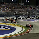 Sebastian Vettel (GER) Ferrari SF15-T leads at the start of the race at Formula One World Championship, Rd13, Singapore Grand Prix, Race, Marina Bay Street Circuit, Singapore, Sunday 20 September 2015. © Sutton Motorsport Images
