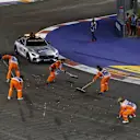 Marshals clear the track at Formula One World Championship, Rd13, Singapore Grand Prix, Race, Marina Bay Street Circuit, Singapore, Sunday 20 September 2015. © Sutton Motorsport Images