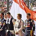 Drivers observe the National Anthem on the grid at Formula One World Championship, Rd13, Singapore Grand Prix, Race, Marina Bay Street Circuit, Singapore, Sunday 20 September 2015. © Sutton Motorsport Images