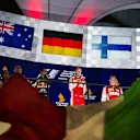 (L to R): Daniel Ricciardo (AUS) Red Bull Racing, Modesta Menabue (ITA) Ferrari Engine Specialist, race winner Sebastian Vettel (GER) Ferrari and Kimi Raikkonen (FIN) Ferrari celebrate on the podium at Formula One World Championship, Rd13, Singapore Grand Prix, Race, Marina Bay Street Circuit, Singapore, Sunday 20 September 2015. © Sutton Motorsport Images