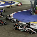 Felipe Massa (BRA) Williams FW37 and Nico Hulkenberg (GER) Force India VJM08 at the start of the race at Formula One World Championship, Rd13, Singapore Grand Prix, Race, Marina Bay Street Circuit, Singapore, Sunday 20 September 2015. © Sutton Motorsport Images