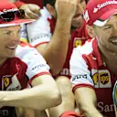 Kimi Raikkonen (FIN) Ferrari and race winner Sebastian Vettel (GER) Ferrari celebrate with the trophy at Formula One World Championship, Rd13, Singapore Grand Prix, Race, Marina Bay Street Circuit, Singapore, Sunday 20 September 2015. © Sutton Motorsport Images