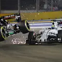 Nico Hulkenberg (GER) Force India VJM08 and Felipe Massa (BRA) Williams FW37 collide at Formula One World Championship, Rd13, Singapore Grand Prix, Race, Marina Bay Street Circuit, Singapore, Sunday 20 September 2015. © Sutton Motorsport Images