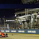 Race winner Sebastian Vettel (GER) Ferrari SF15-T crosses the line and takes the chequered flag at Formula One World Championship, Rd13, Singapore Grand Prix, Race, Marina Bay Street Circuit, Singapore, Sunday 20 September 2015. © Sutton Motorsport Images