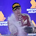 Kimi Raikkonen (FIN) Ferrari celebrates on the podium with the champagne at Formula One World Championship, Rd13, Singapore Grand Prix, Race, Marina Bay Street Circuit, Singapore, Sunday 20 September 2015. © Sutton Motorsport Images