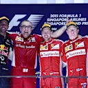 Podium (L to R): Daniel Ricciardo (AUS) Red Bull Racing, Modesta Menabue (ITA) Ferrari Engine Specialist, race winner Sebastian Vettel (GER) Ferrari and Kimi Raikkonen (FIN) Ferrari celebrate on the podium at Formula One World Championship, Rd13, Singapore Grand Prix, Race, Marina Bay Street Circuit, Singapore, Sunday 20 September 2015. © Sutton Motorsport Images
